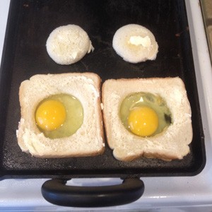 Place on pan and add eggs
